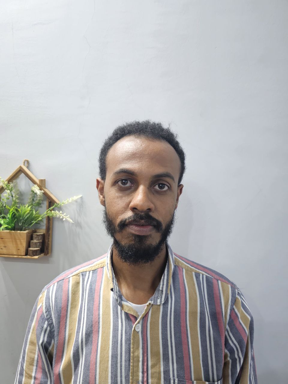 Portrait of Zerubabel Nahusenay, Logistics Director and Assistant Executive Director at Ethio Catalyst
